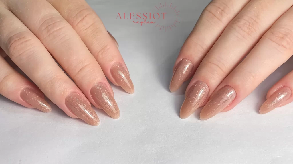 Neutral-toned, almond-shaped gel nails showing how long do gel nails last, highlighting the durability and stylish finish of gel manicures.